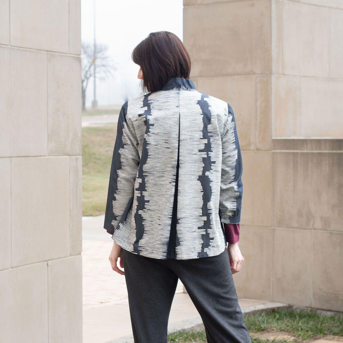 Back view of the Detour Jacket made in a printed denim fabric. Back view of the Detour Jacket made in a printed denim fabric.