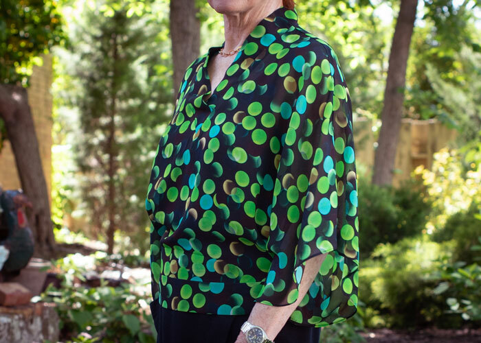 The Coco Blouse made in a green dot sheer silk fabric. 
