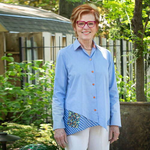 The Hibiscus Shirt made with three different blue shirting fabrics, and orange buttons. 