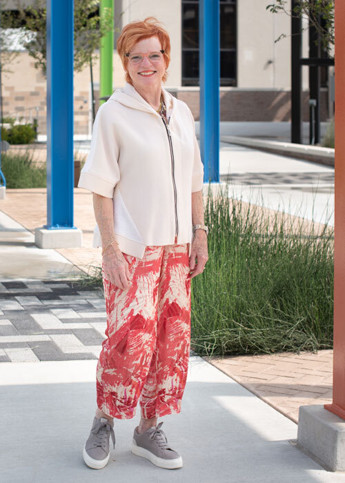 The Chesney Pants made in red print silk fabric. Worn with the West End top. The Chesney Pants made in red print silk fabric. Worn with the West End top.