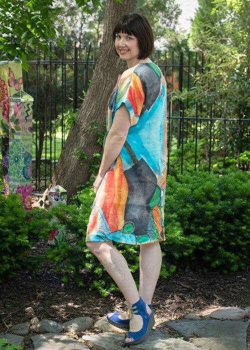 Side view of the Gardenia Dress made in a blue bold print Ramie Linen fabric. 