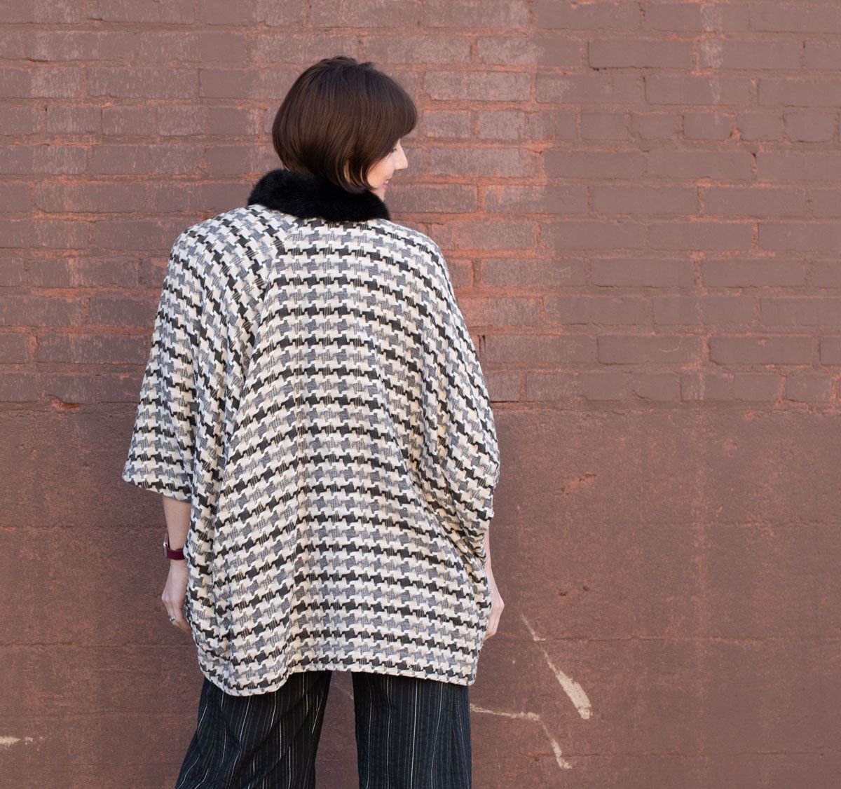 Back view of the Deja Vu Wrap made with a faux fur collar. Back view of the Deja Vu Wrap made with a faux fur collar.