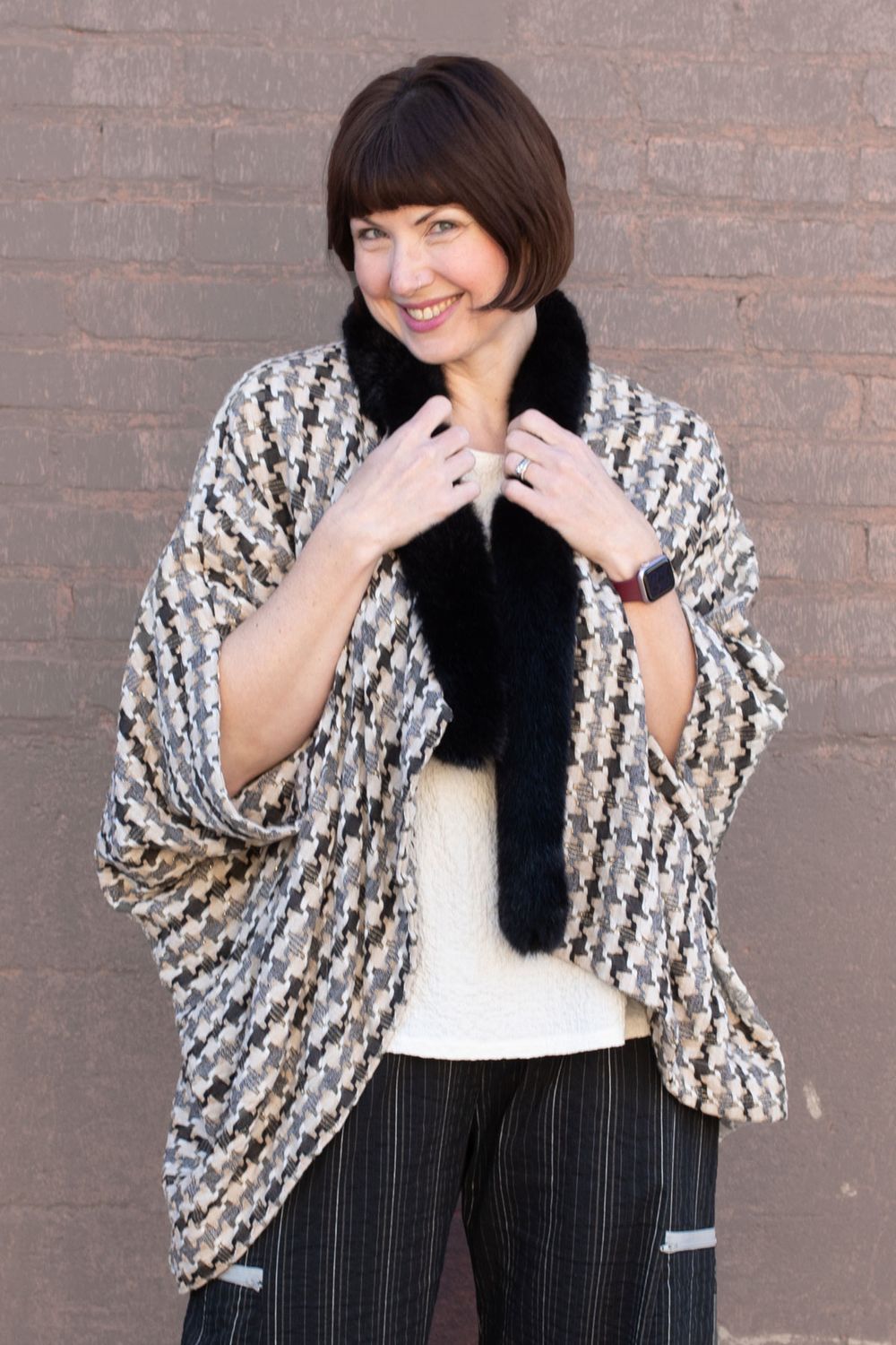 The Deja Vu Wrap made with a faux fur collar. 