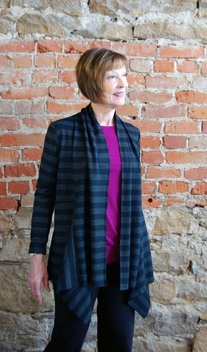 Ann's Cardigan in a black and grey stripe knit. 