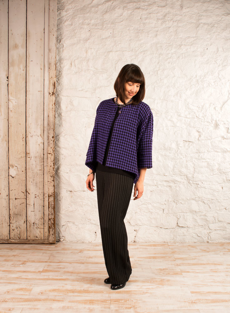 The High Five Jacket made with purple and black checked jacquard fabric. The High Five Jacket made with purple and black checked jacquard fabric.