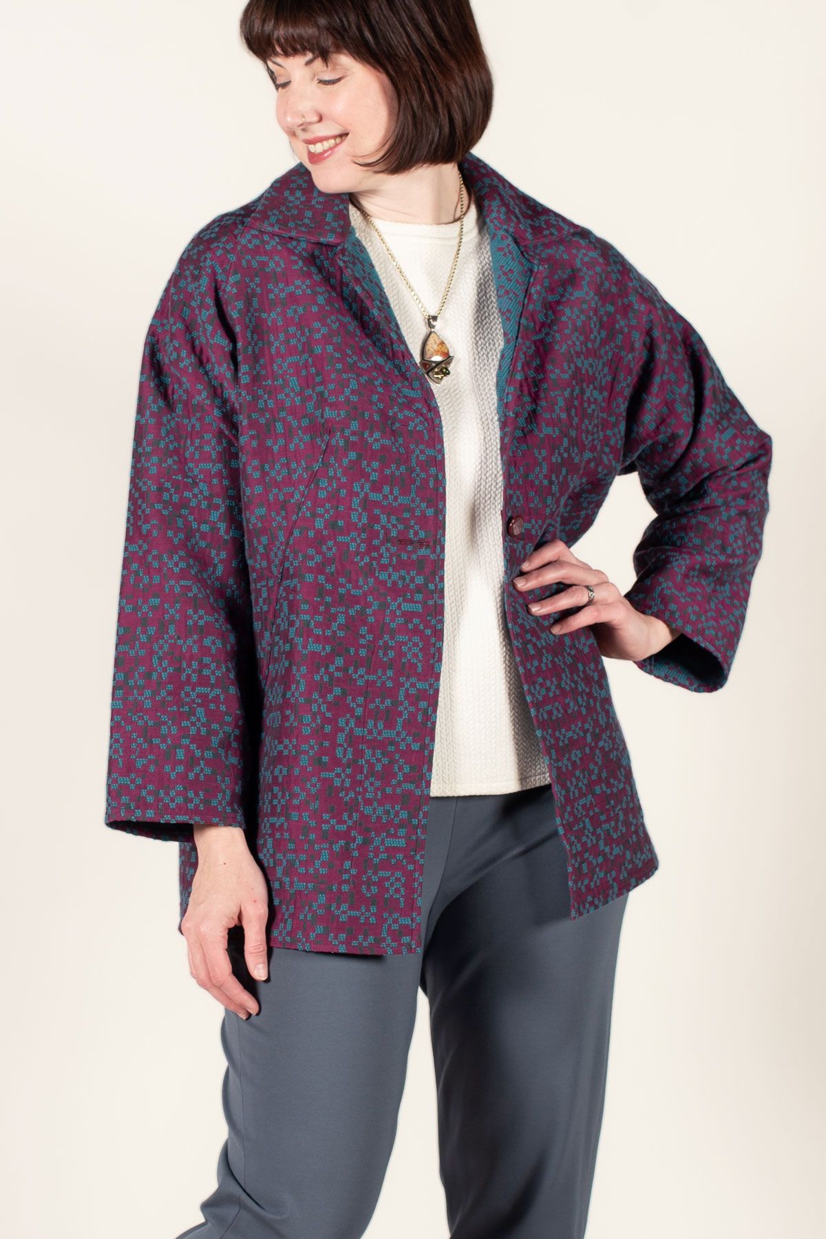 The Chicago Jacket in a double-sided red and gray jacquard fabric. The Chicago Jacket in a double-sided red and gray jacquard fabric.