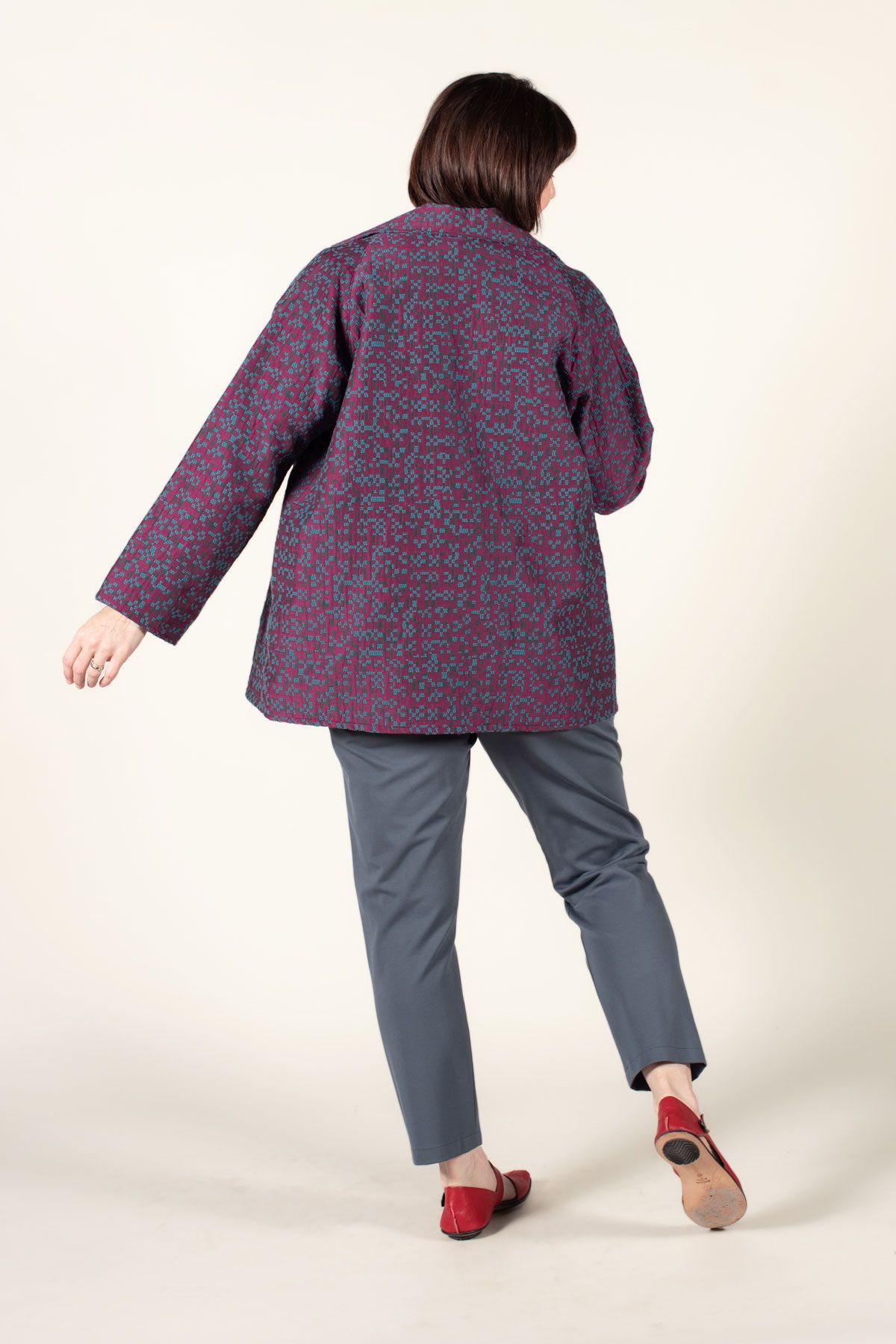 The Chicago Jacket in a double-sided red and gray jacquard fabric. Worn with the Helix Pants. The Chicago Jacket in a double-sided red and gray jacquard fabric. Worn with the Helix Pants.