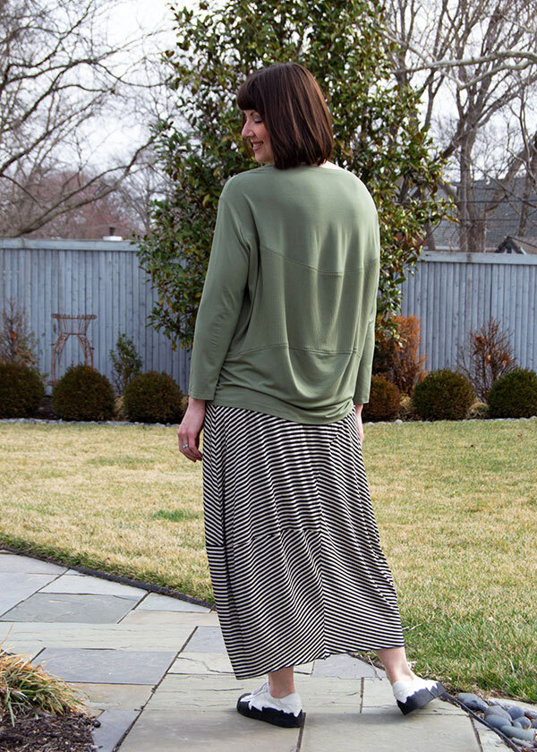 Back view of the Edgewater Skirt made in black and white striped jersey knit paired with the Crane St. Tee. 