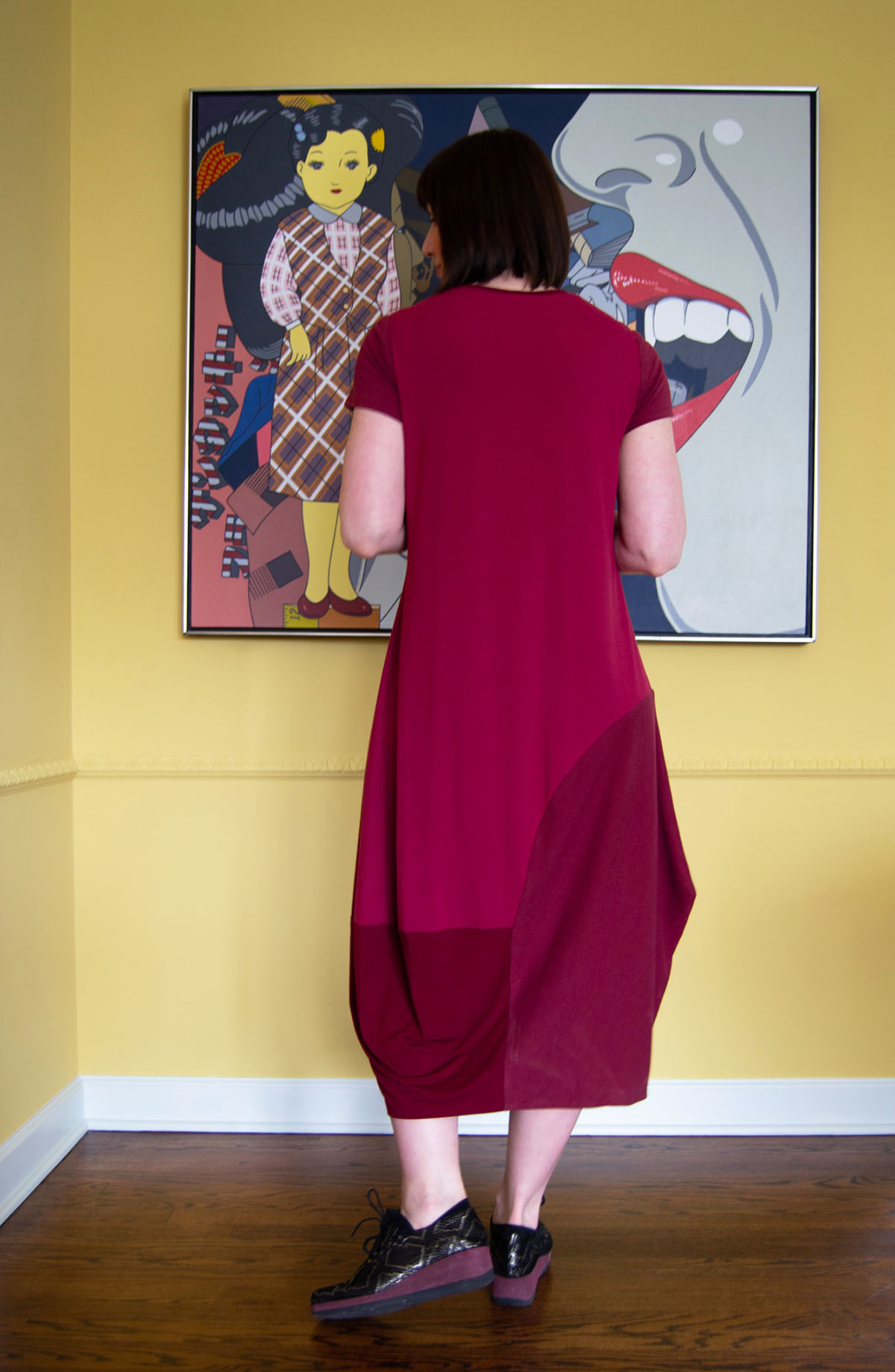 Back view of the Edgewater Dress made in a combination of  burgundy rib and jersey knit fabrics.