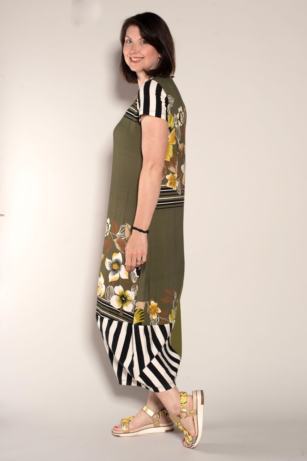 Side view of the Edgewater Dressed made with a combination of solid and print jersey knit fabric. 