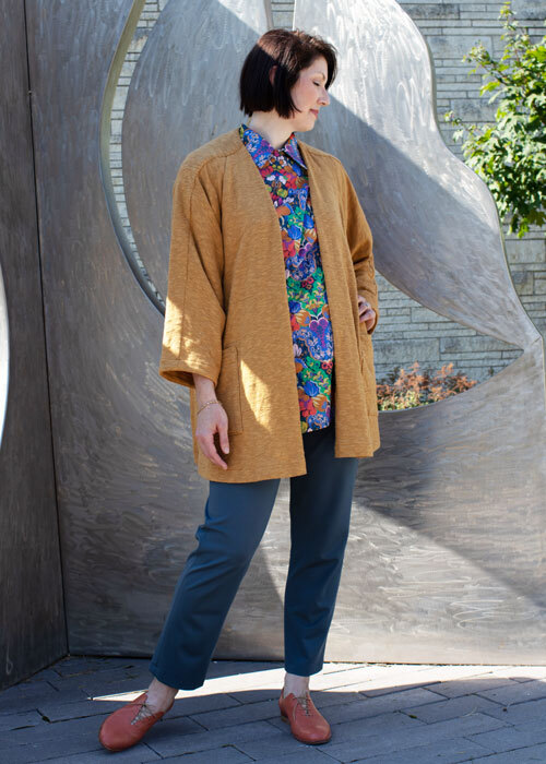 The long version of the Haiku Two Jacket worn with the Helix Pants and the Willow Blouse.