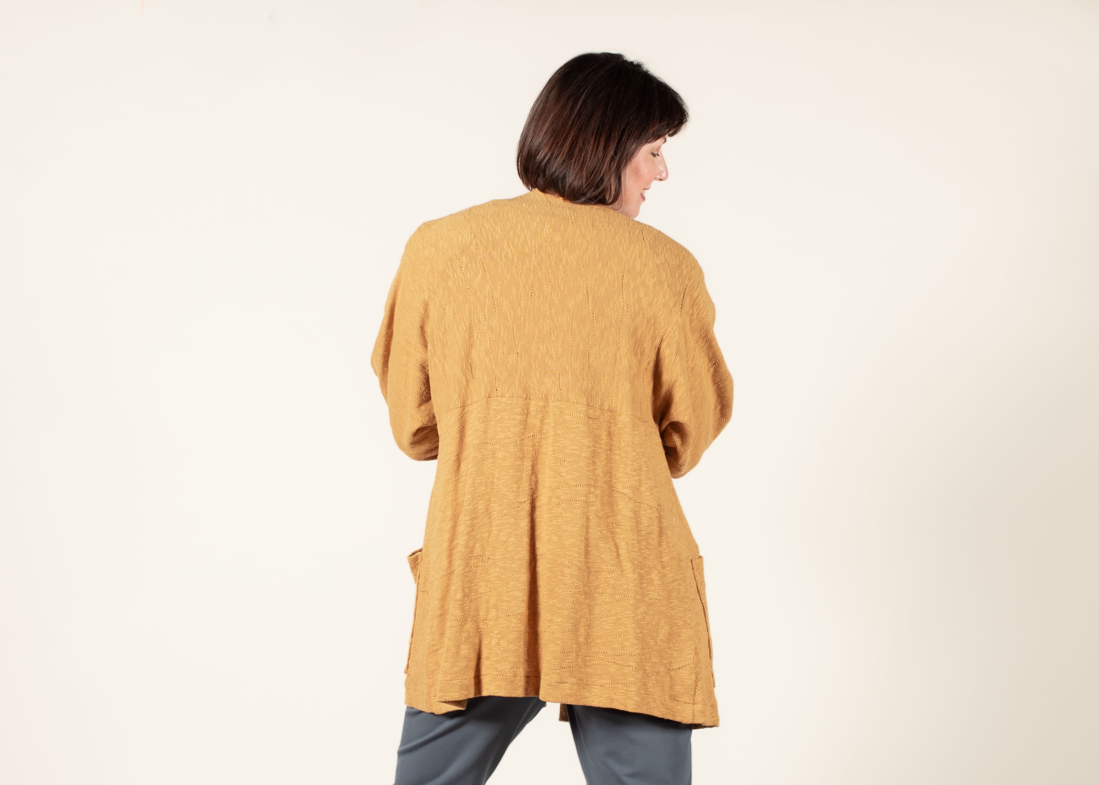 Back view of the Haiku Two Jacket made in a yellow sweater knit. 