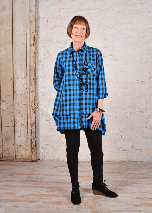 The Florence Shirt made in a blue and white gingham check fabric. 