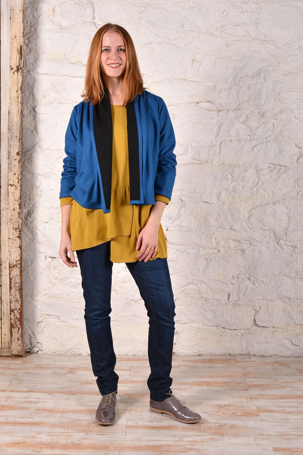 The eJacket made with a double sided blue and black knit fabric. 