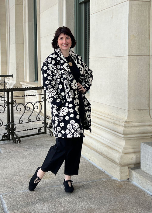The Carnelian Coat in black and white jacquard fabric. 