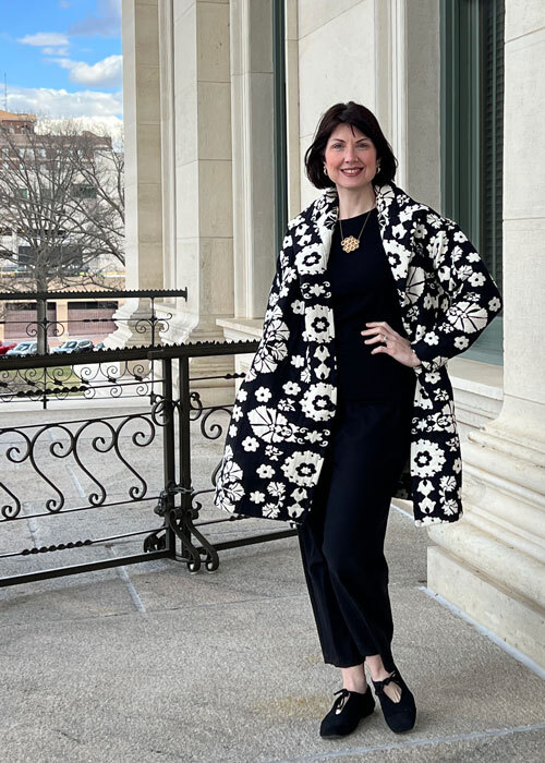 The Carnelian Coat in black and white jacquard fabric. 