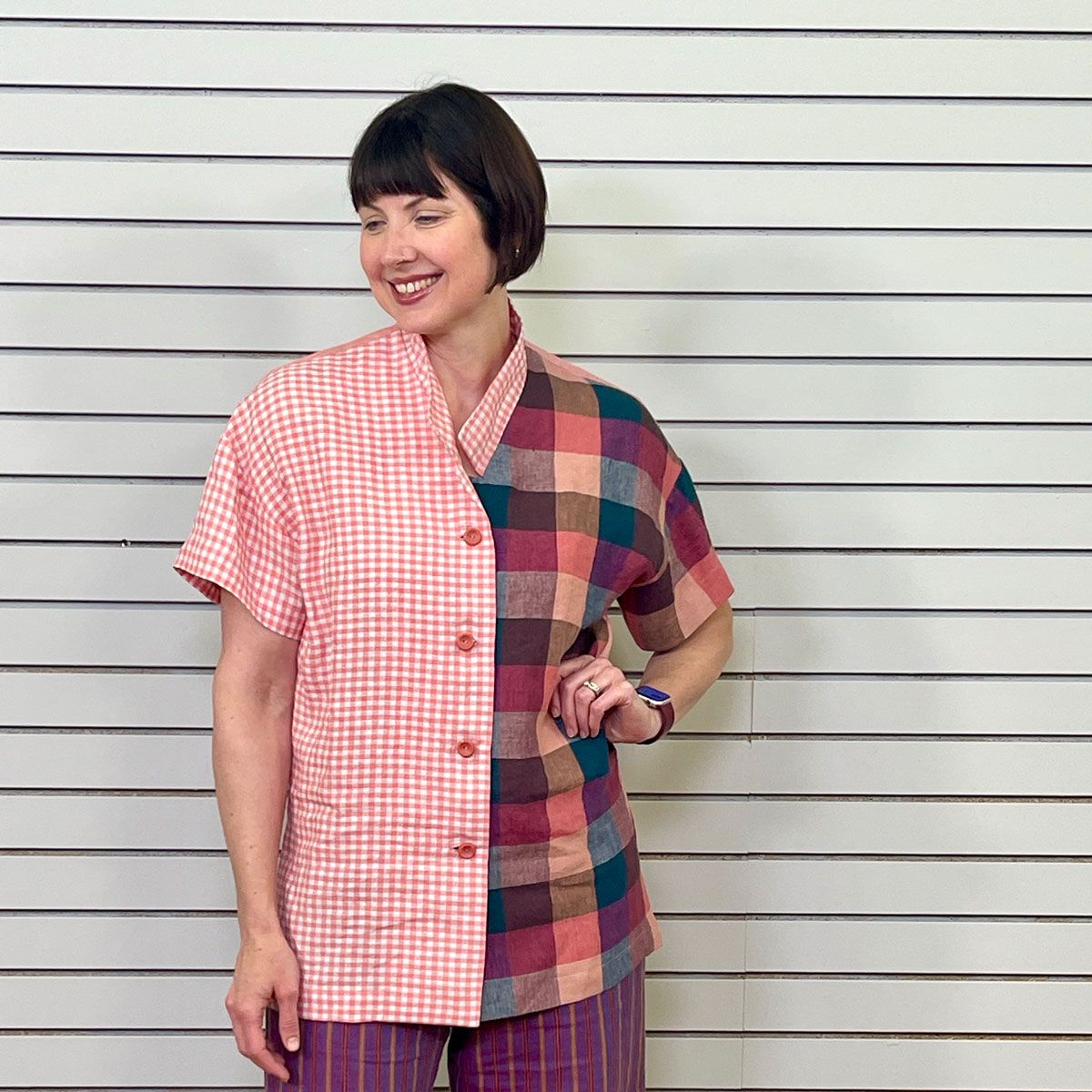 The Elle Shirt made with two different pink linen gingham fabric. The Elle Shirt made with two different pink linen gingham fabric.