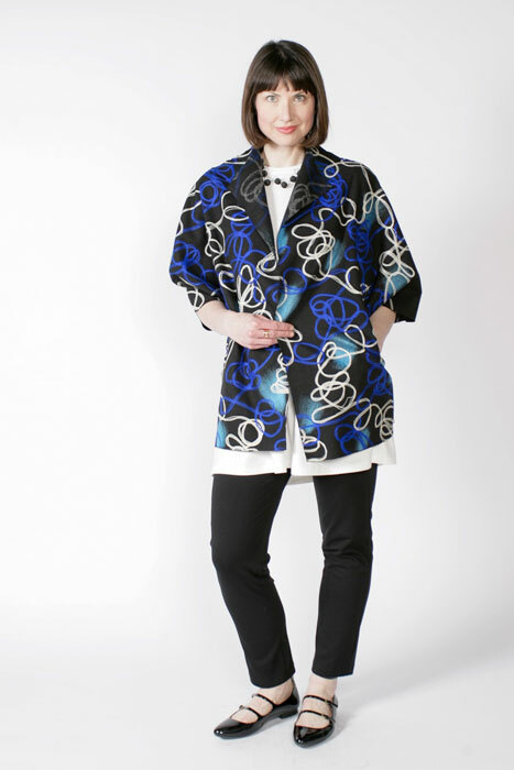 Chateau coat pattern made in blue and white wool swirl fabric.
