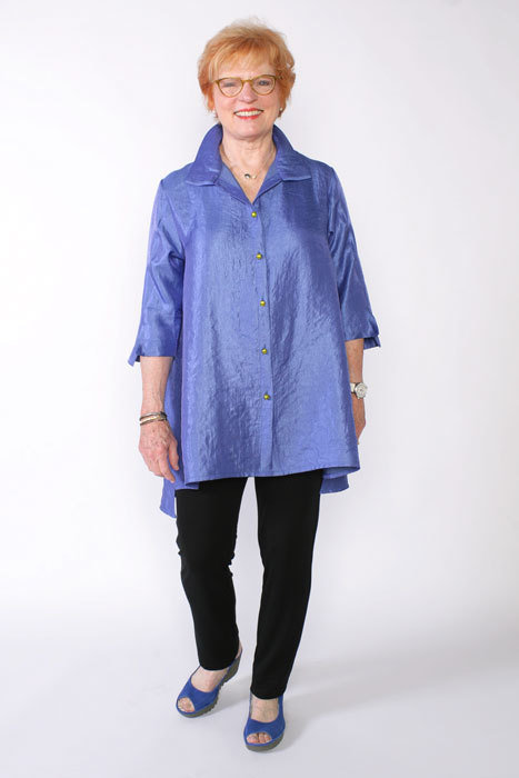 The Florence Shirt made in a shiny mid-weight blue silk fabric. 