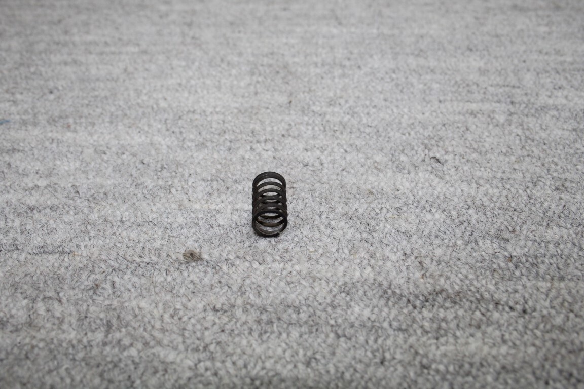 Drukveer voor pal handrem handle