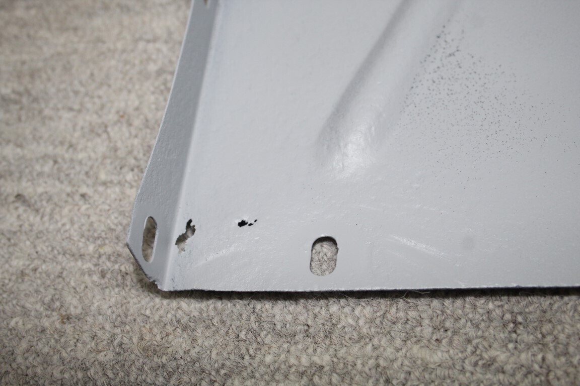 Spatplaat voorscherm links