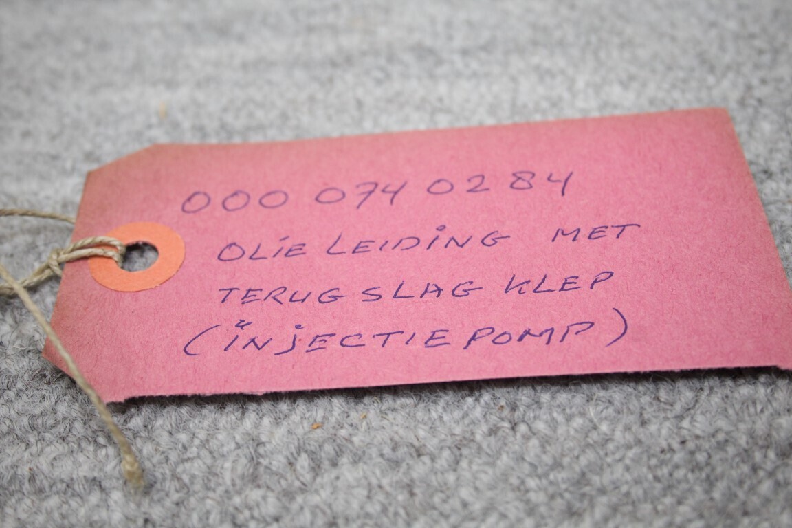 Olieleiding met terugslagklep