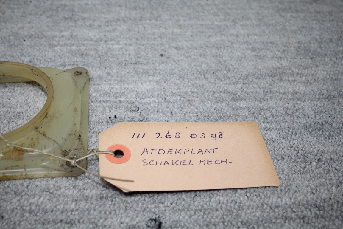 Afdekplaat schakel mechanisme