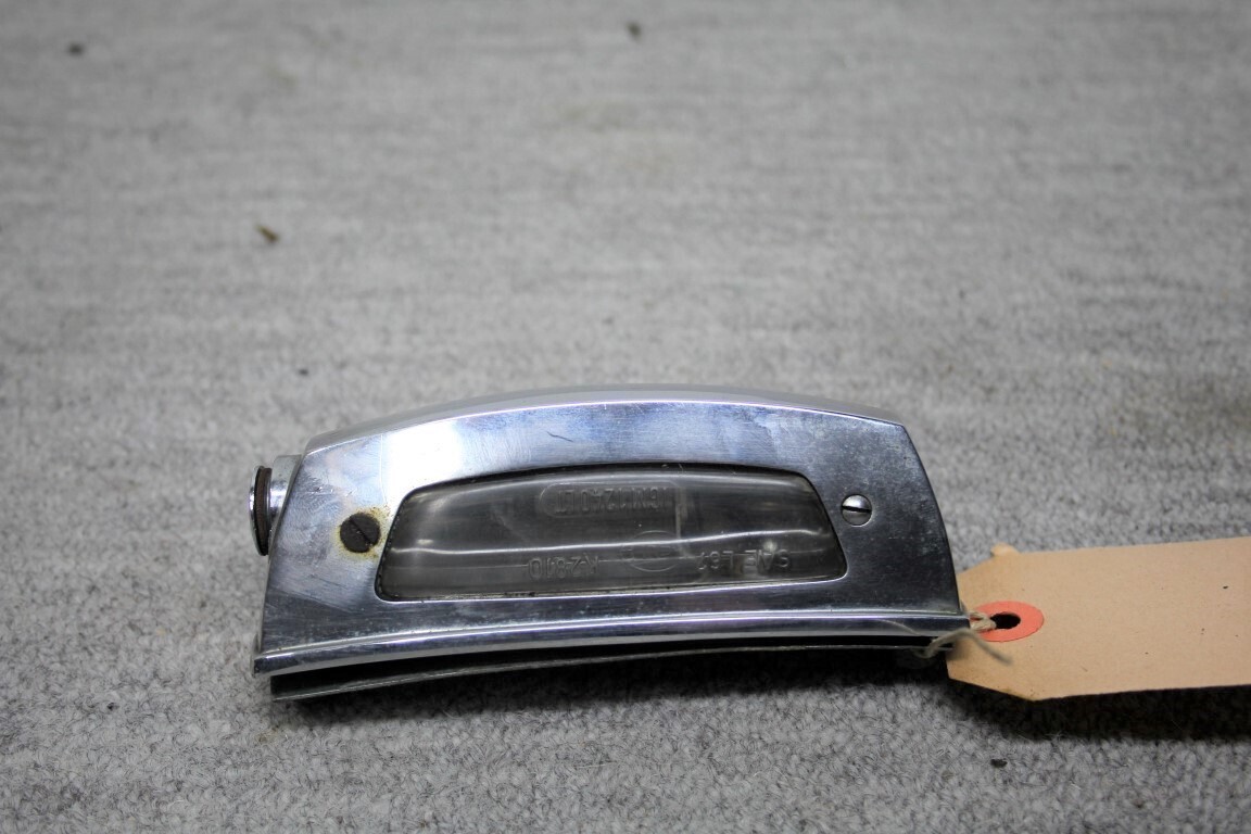 Nummerplaat verlichting links