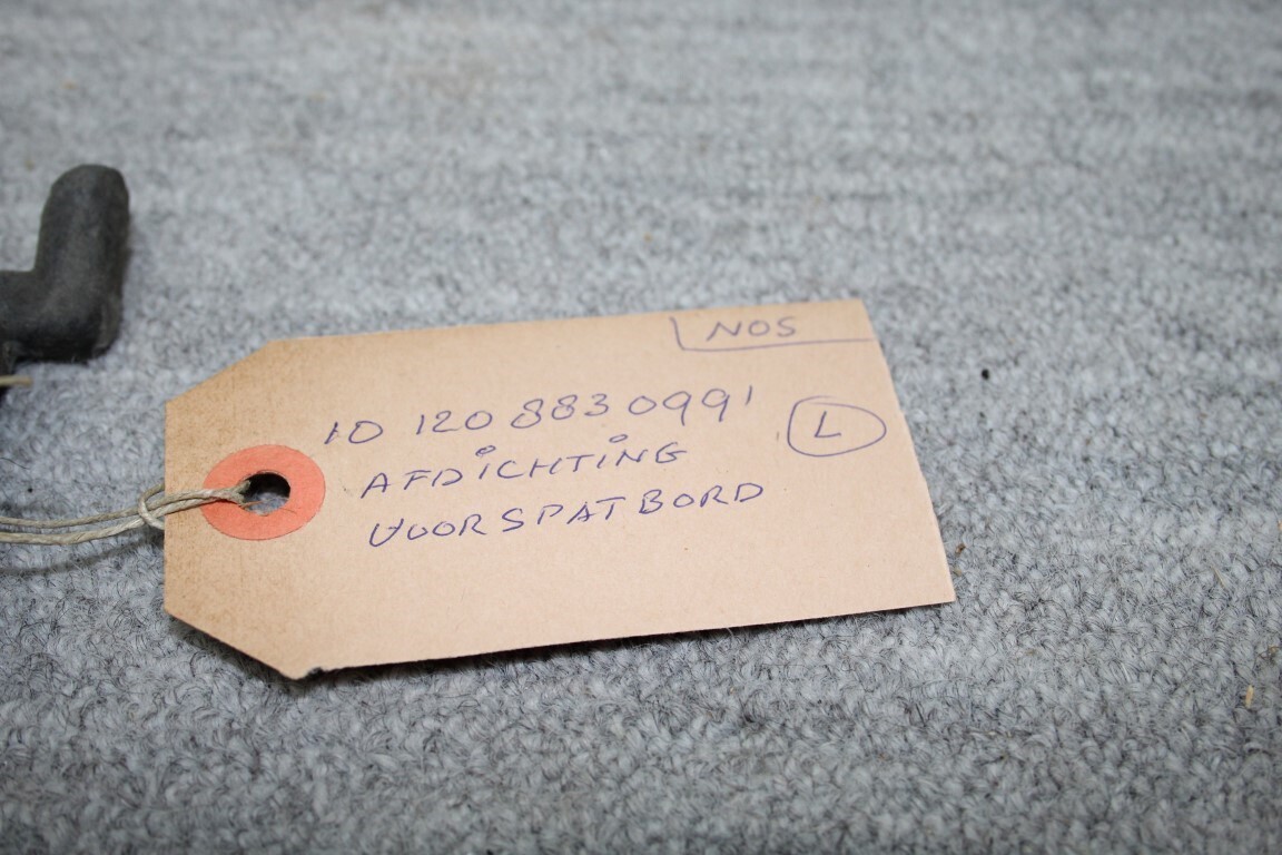 Afdichting voorspatbord links