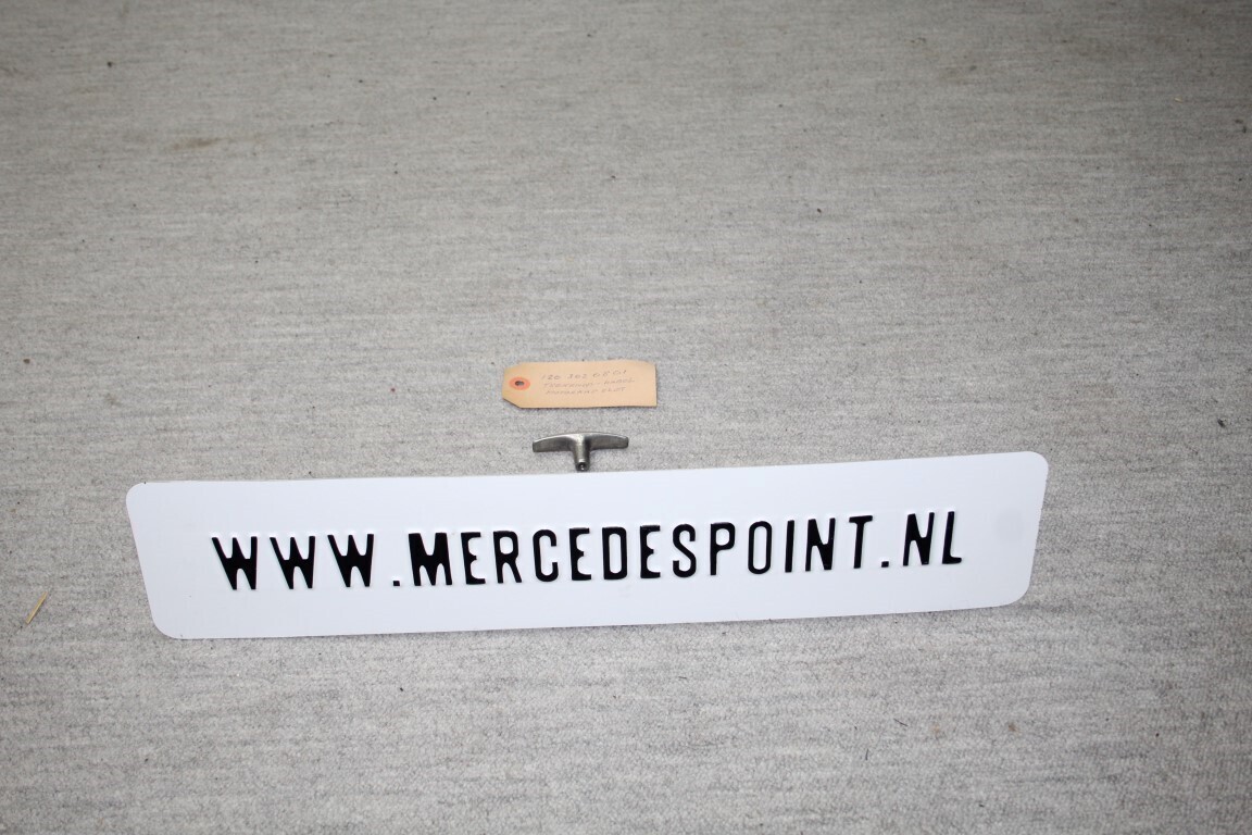 Trekknop motorkapslot