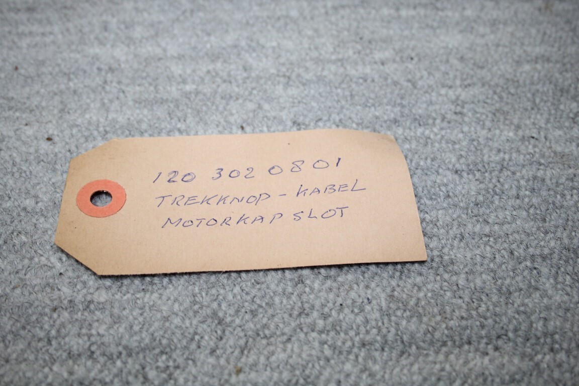 Trekknop motorkapslot