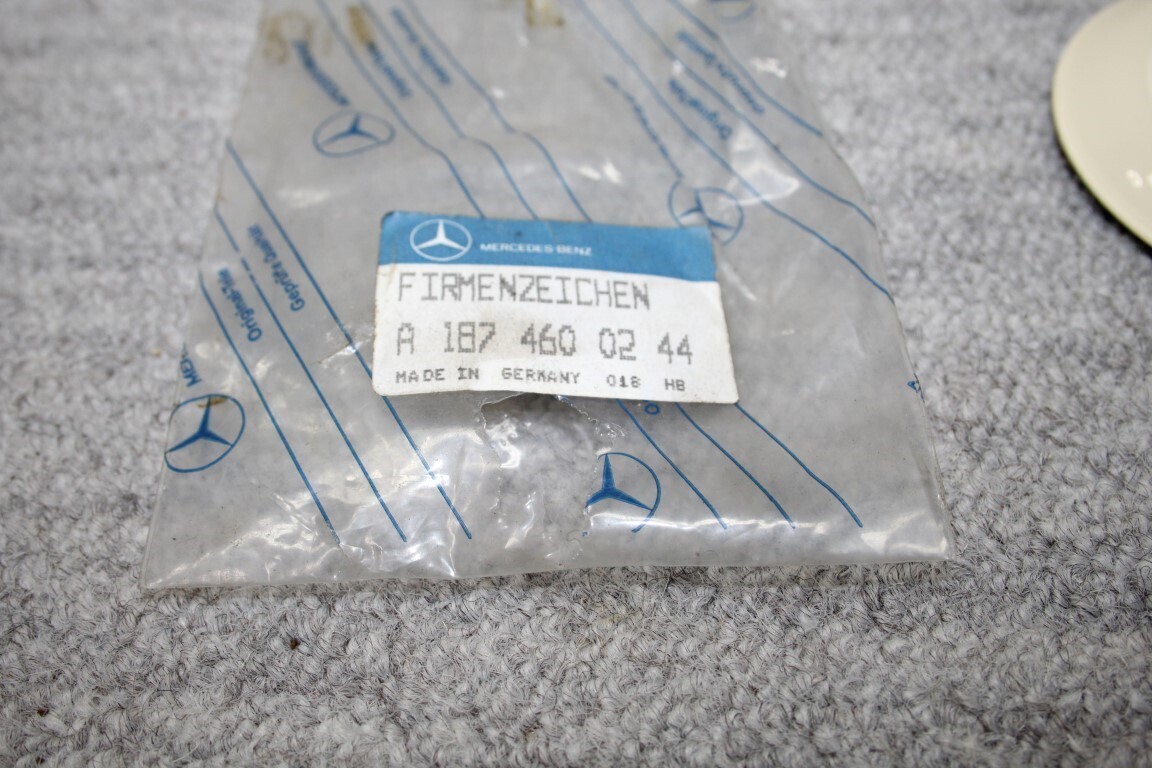 Merkteken stuurwiel ivoor