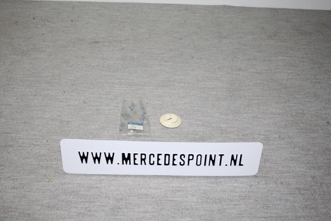 Merkteken stuurwiel ivoor