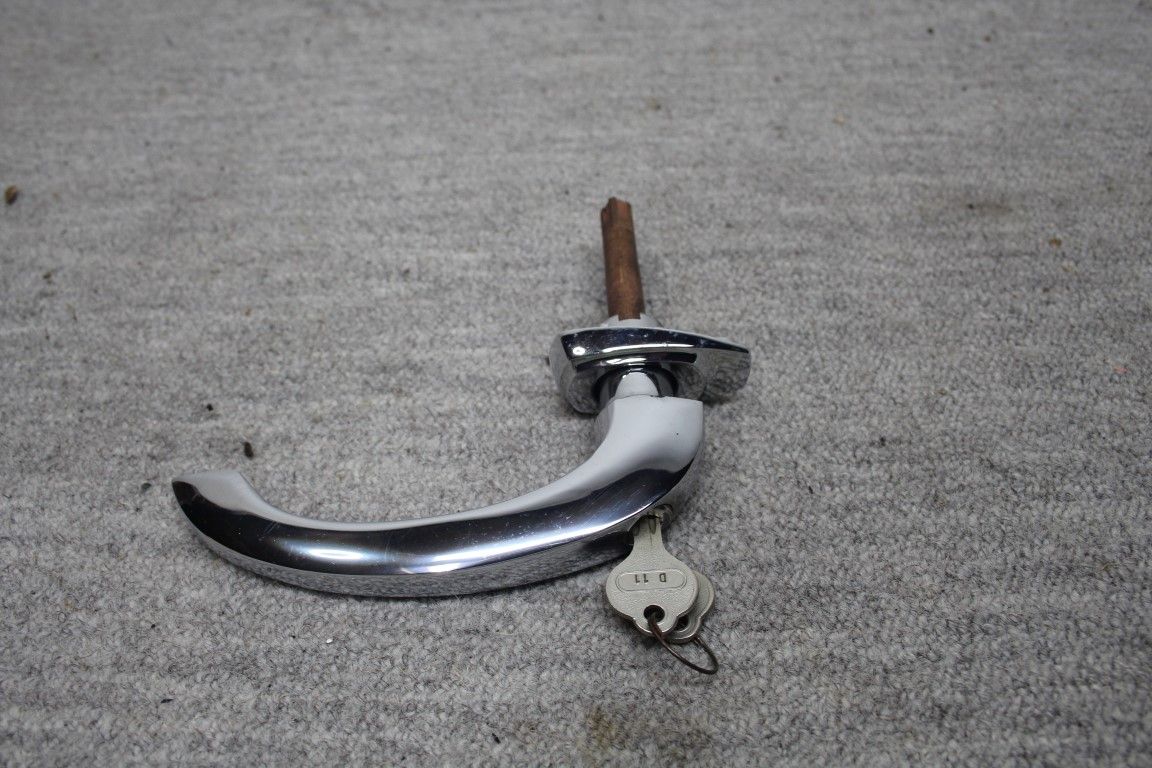 Deurkruk met sleutel NOS