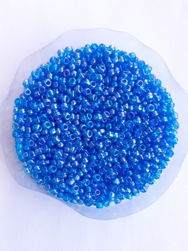 2000 perles en verre 2MM (32g) bleu transparent nacré