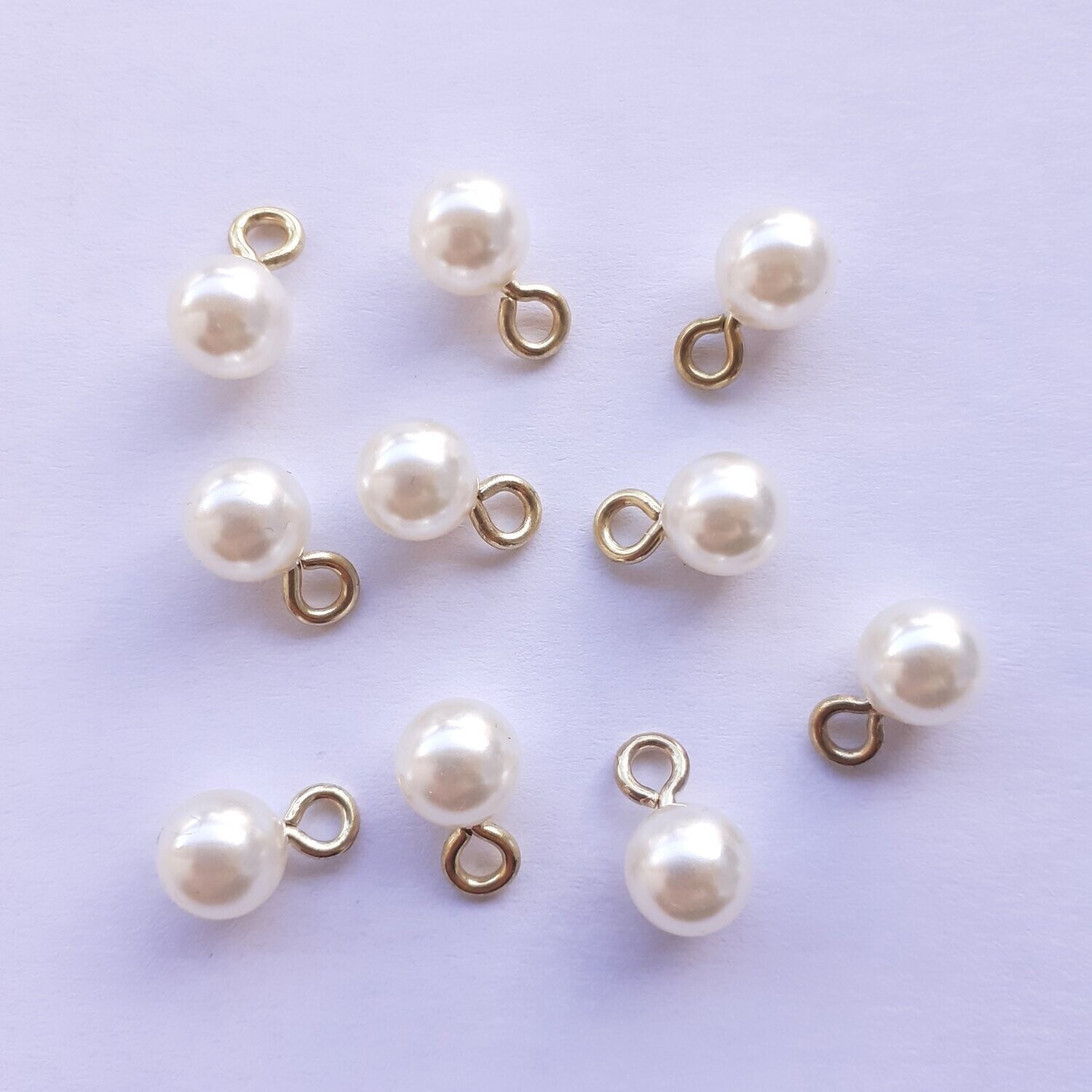 Boutons perles avec anneau doré Boutons perles avec anneau doré