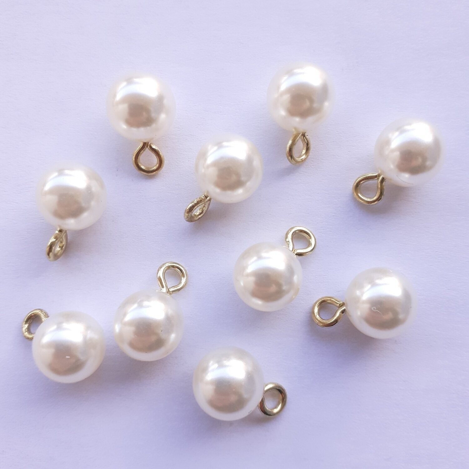 Boutons perles avec anneau doré Boutons perles avec anneau doré