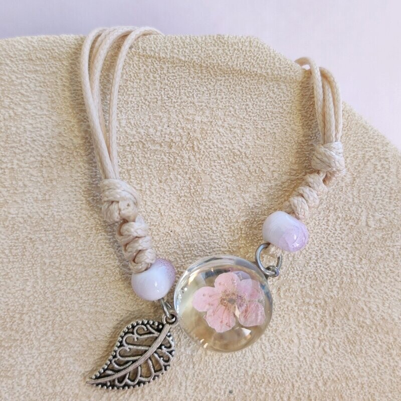 Bracelet floral boule de verre fleur rose clair