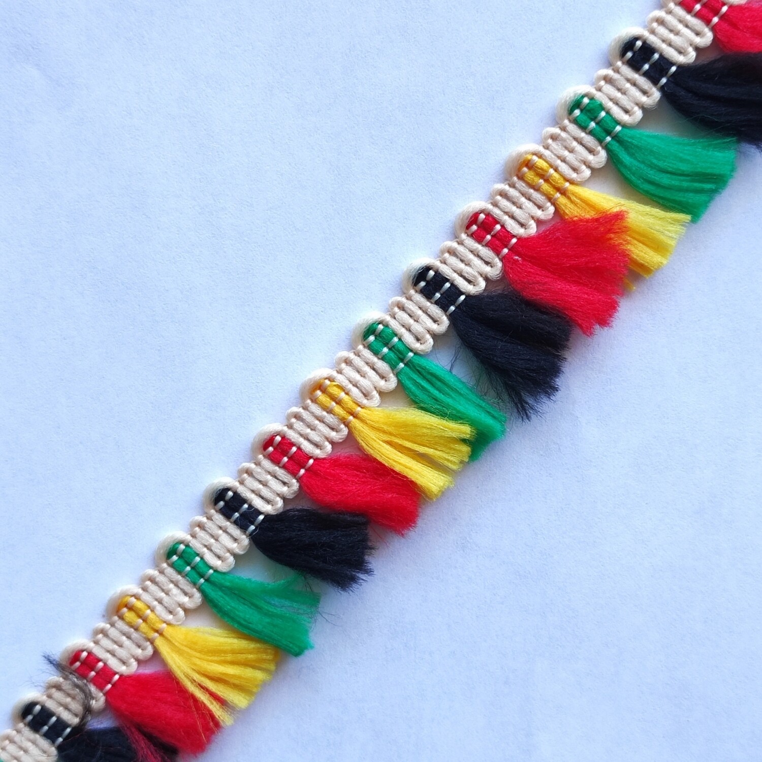 Galon pompon noir/rouge/vert/jaune