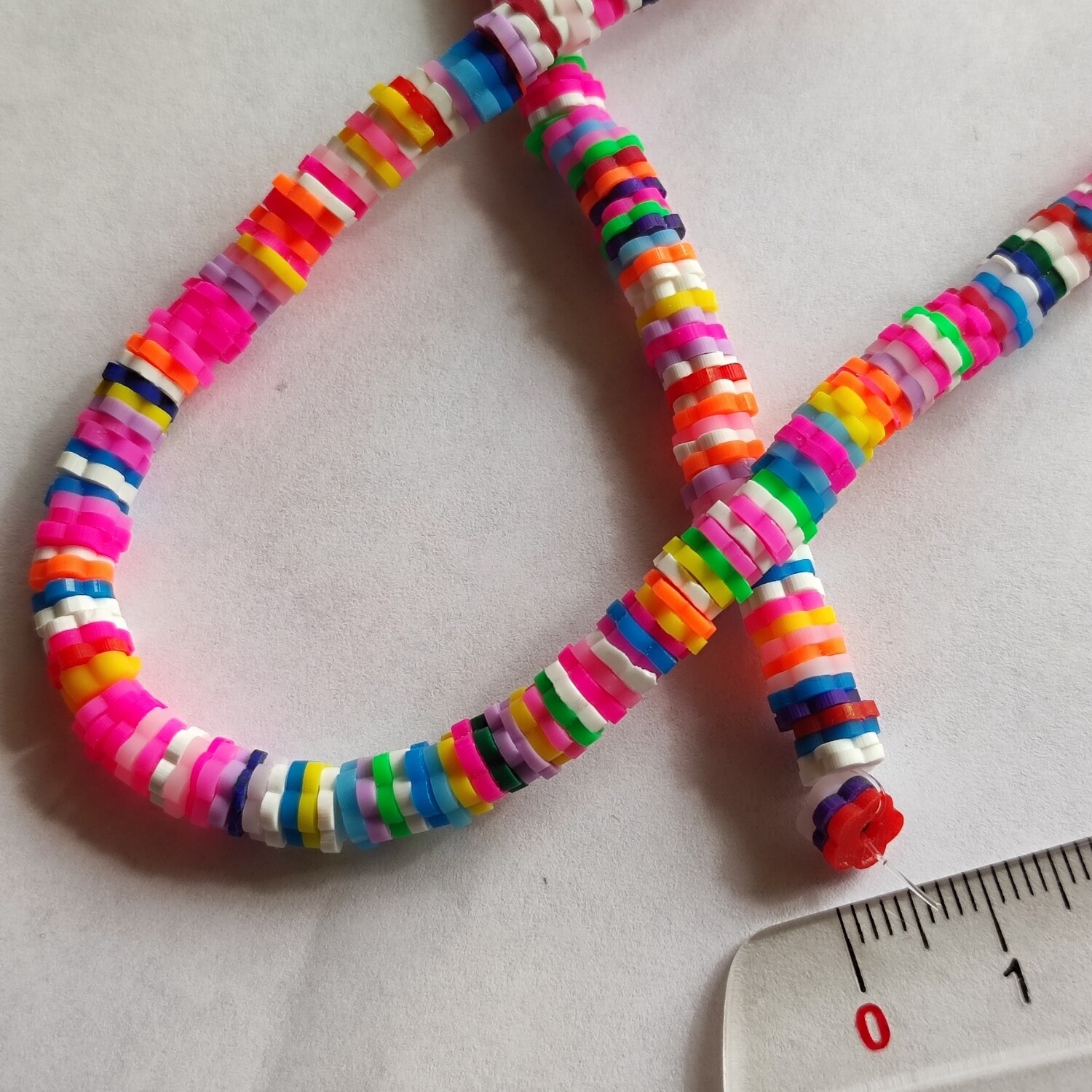 Perles heishi fleurs 6x 1mm par 40cm