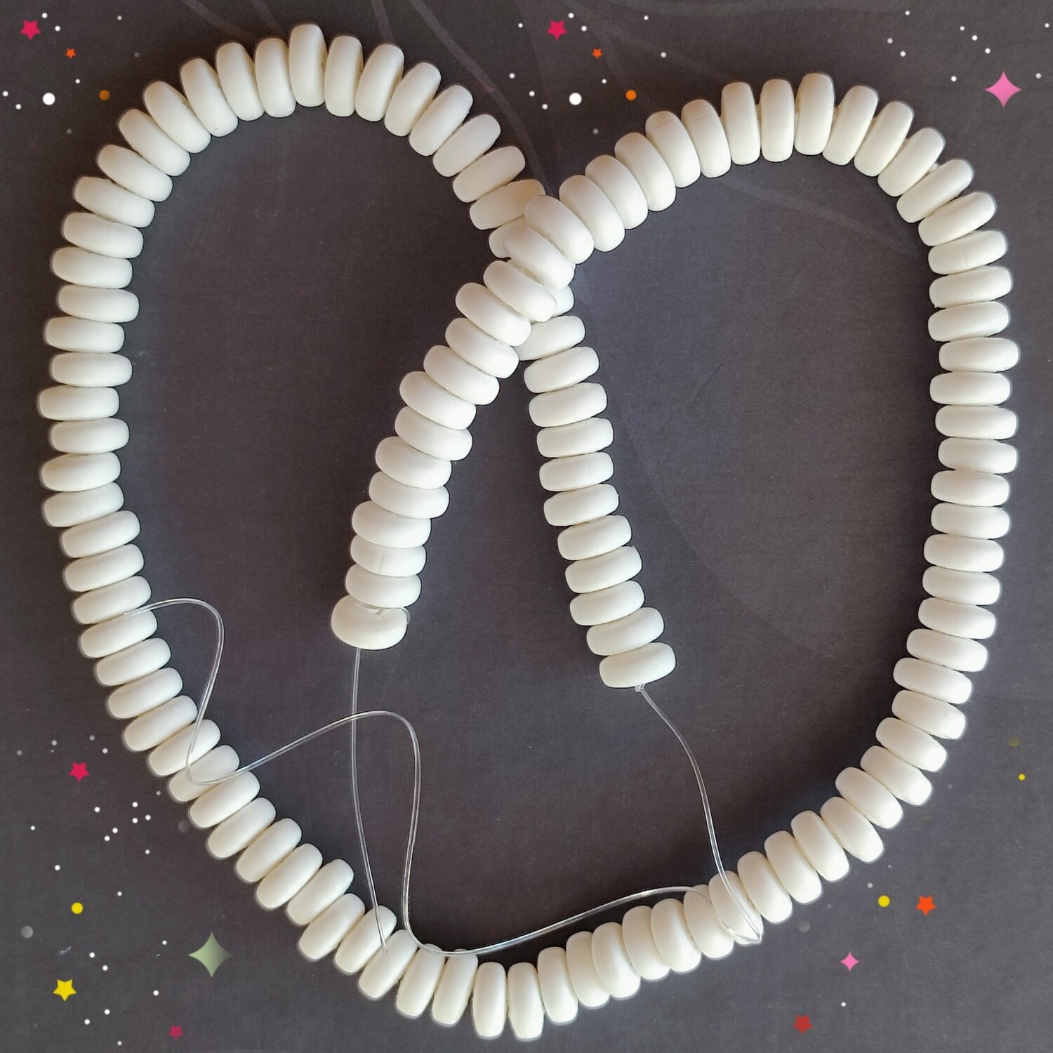 110 perles 7x4mm blanches