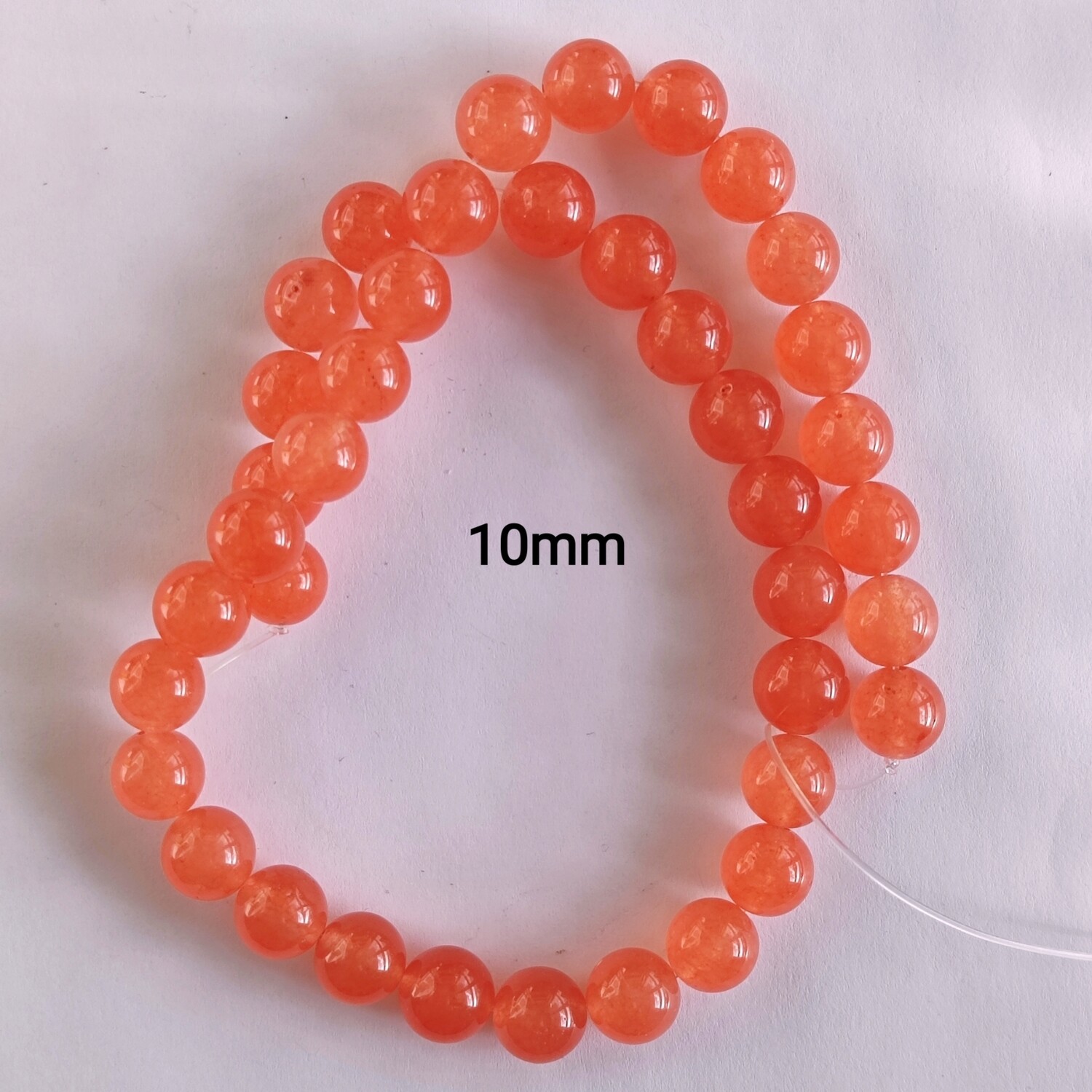 Perles pierre naturelle angélite 10mm orange/rouge