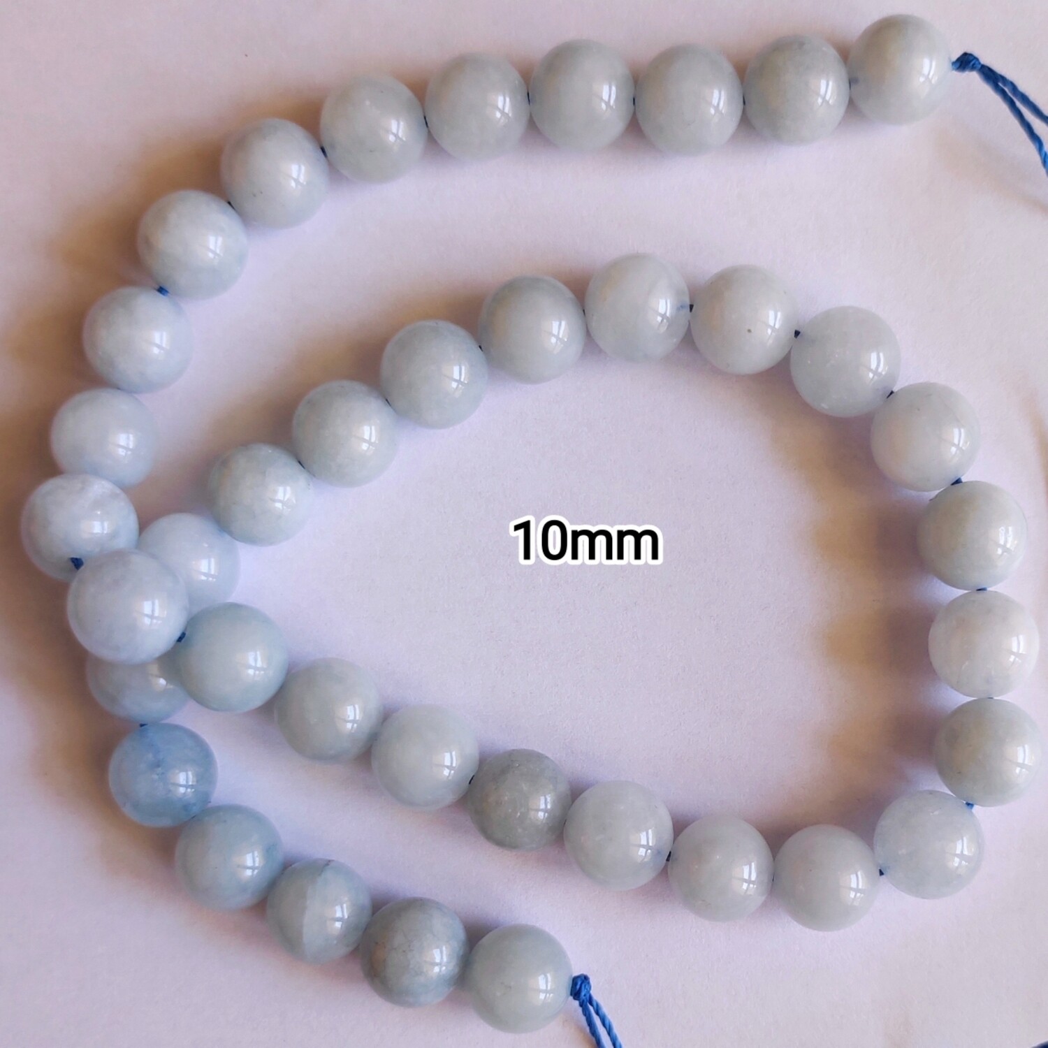 Perles pierre naturelle angélite 10mm bleu / gris 