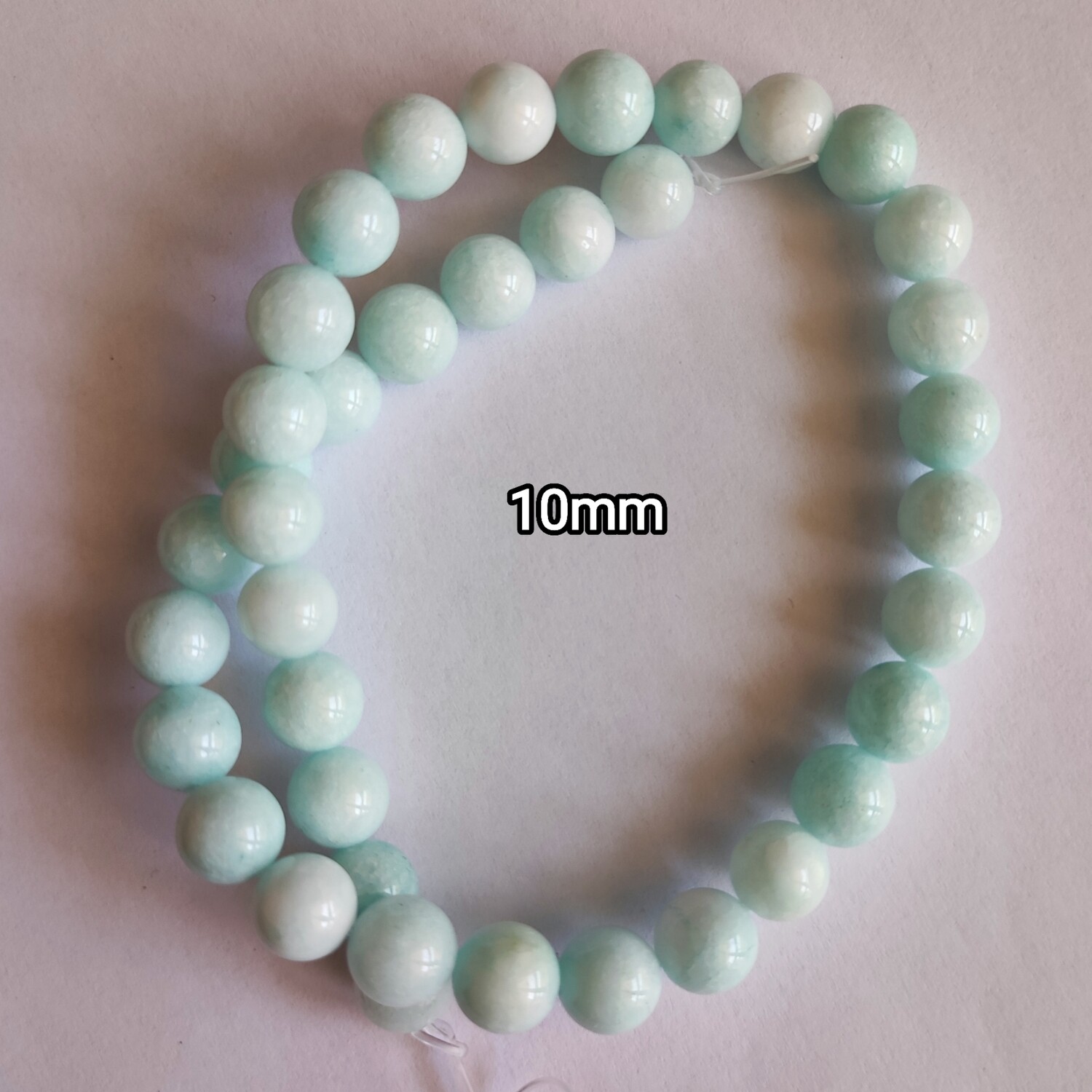 Perles pierre naturelle angélite 10mm bleu clair 