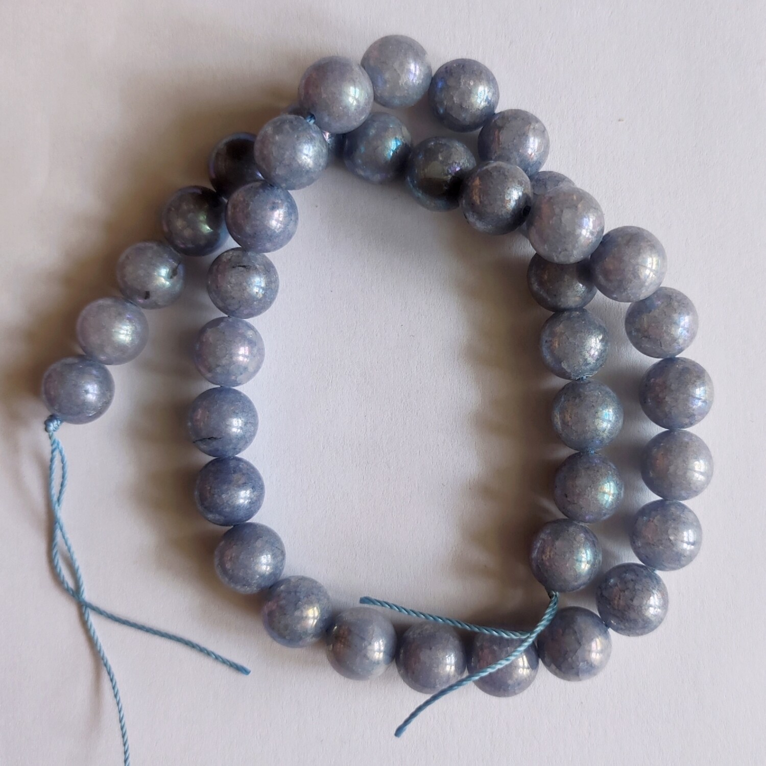 Perles pierre naturelle angélite 10mm brillant noir bleu