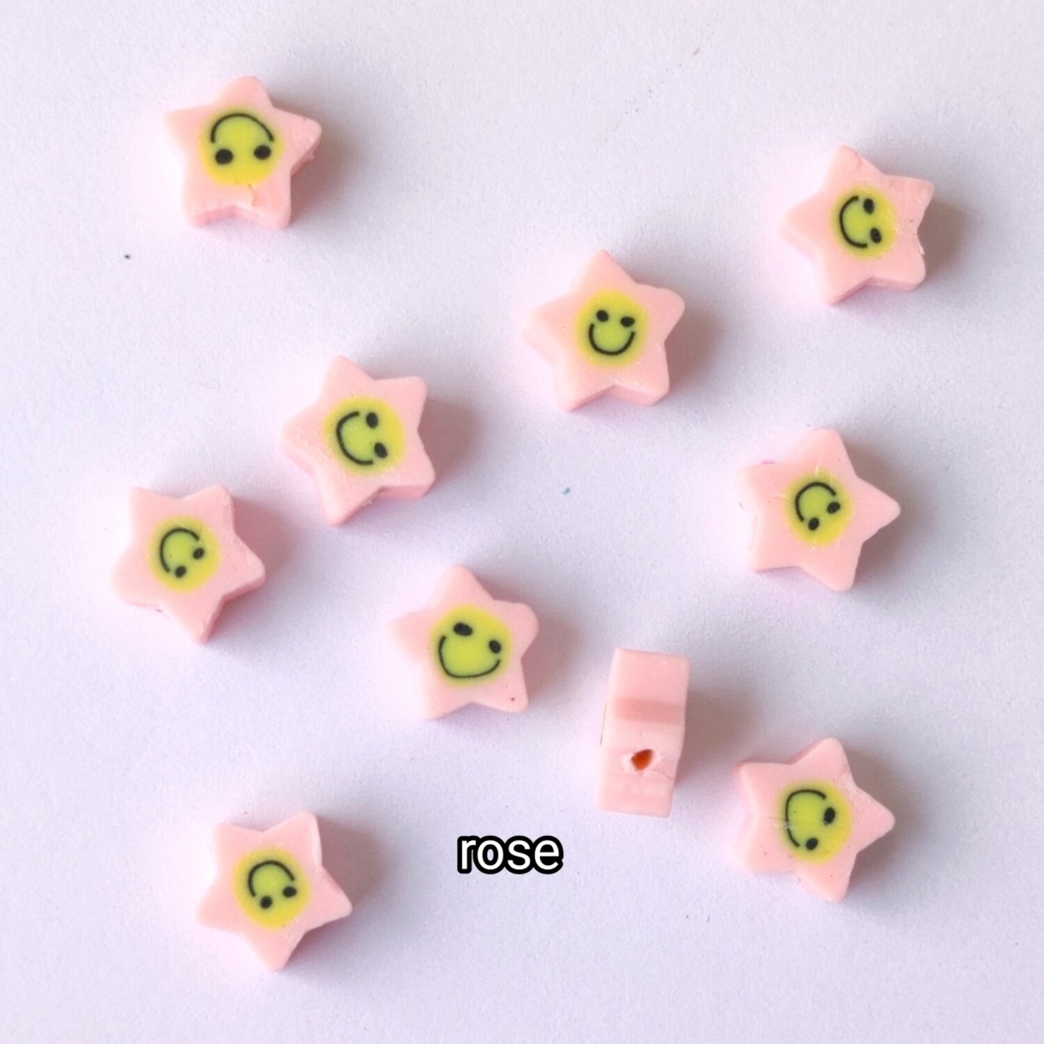 10 perles polymère étoiles rose