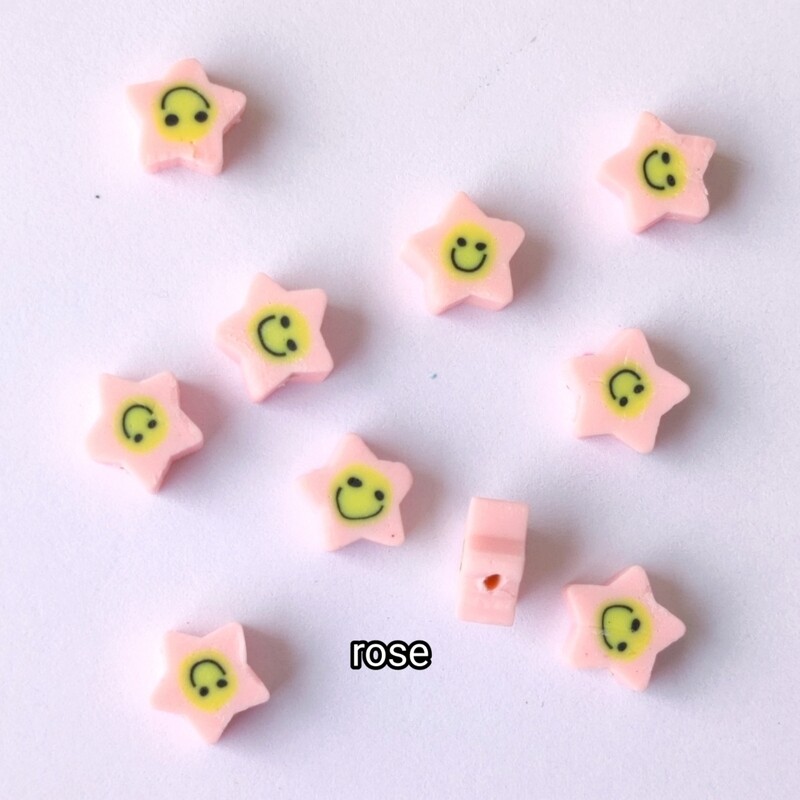 10 perles polymère étoiles rose