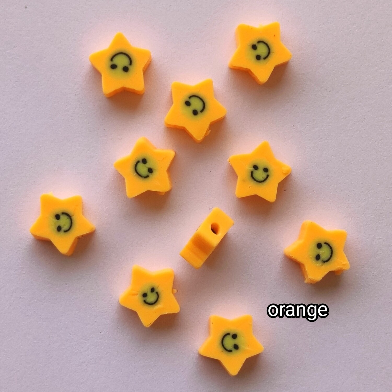 10 perles polymère étoiles orange