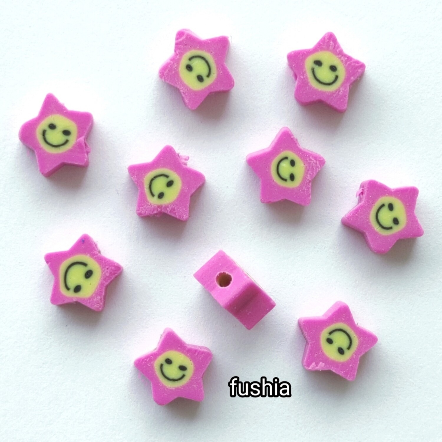 10 perles polymère étoiles fushia 