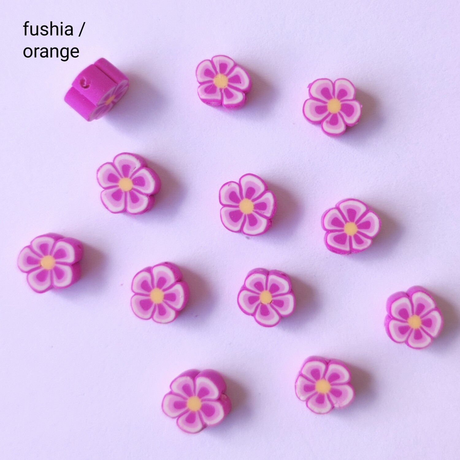 10 perles fleurs fushia/orange 